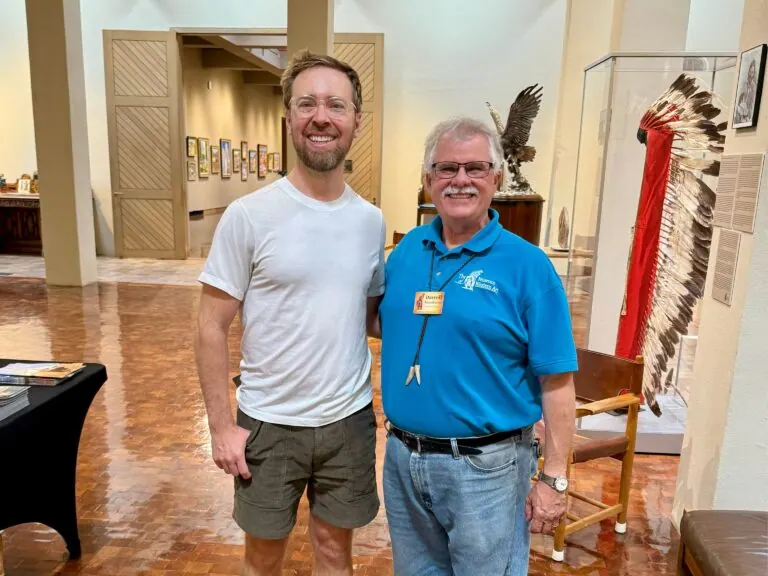 Nick Gray with the director of the Museum of Western Art in Kerrville, Texas